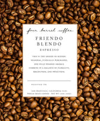 This image features the "Friendo Blend Espresso" from Four Barrel Coffee, presented amidst a backdrop of coffee beans. The espresso blend is highlighted in a visually appealing manner with a clear and informative label at the center.