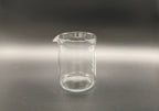 Clear cylindrical French Press Glass Replacement carafe with a pouring spout.