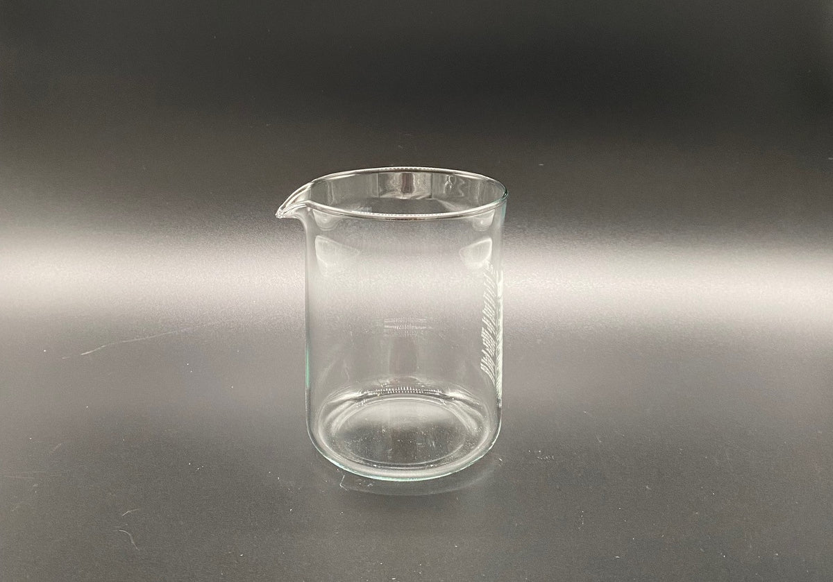 Clear cylindrical French Press Glass Replacement carafe with a pouring spout.